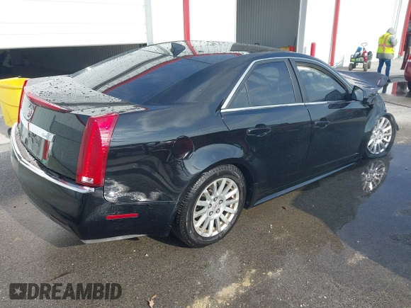 2011 Cadillac CTS with VIN 1G6DC5EY7B0118590, listed as a IAAI auction lot 41003246 with Not provided miles and . Bid and sale history available at DreamBid. Image 4.