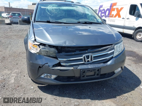 2011 Honda Odyssey Touring Elite with VIN 5FNRL5H96BB043339, listed as a IAAI auction lot 42174767 with 161,233 mi miles and . Bid and sale history available at DreamBid. Image 6.