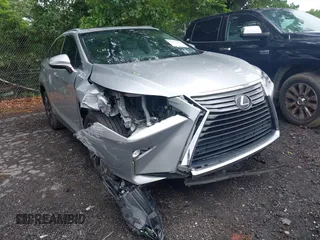 2018 Lexus RX 350 z VIN 2T2ZZMCA4JC100212, wystawiony jako IAAI lot #42197456 z przebiegiem 63 078 mil mil oraz . Historia ofert i sprzedaży dostępna na DreamBid. Obrazek 1.