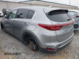 2021 Kia Sportage LX with VIN KNDPM3AC2M7931660, listed as a IAAI auction lot 41924609 with 55,512 mi miles. Bid and sale history available at carsss.com. Image 3.