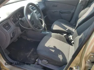 2011 Kia Rio with VIN KNADH4B38B6725531, listed as a Copart auction lot 72389974 with 124,315 mi miles and Salvage Title. Bid and sale history available at DreamBid. Image 7.