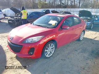 2012 Mazda 3 S Grand Touring with VIN JM1BL1W53C1658421, listed as a IAAI auction lot 41294572 with 100,875 mi miles and . Bid and sale history available at DreamBid. Image 2.