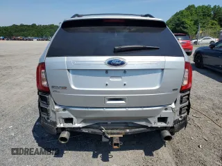 2014 Ford Edge SE z VIN 2FMDK4GC3EBB06138, wystawiony jako Copart lot #60747405 z przebiegiem 135 620 mil mil oraz Szkoda całkowita • Salvage title. Historia ofert i sprzedaży dostępna na DreamBid. Obrazek 6.