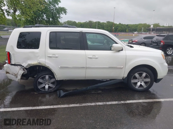2013 Honda Pilot Touring with VIN 5FNYF4H96DB016044, listed as a IAAI auction lot 42314590 with 183,913 mi miles and . Bid and sale history available at DreamBid. Image 13.