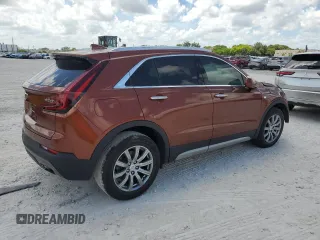 2019 Cadillac XT4 FWD Premium Luxury with VIN 1GYFZCR41KF183507, listed as a Copart auction lot 61581215 with 64,803 mi miles and Salvage title. Bid and sale history available at DreamBid. Image 3.