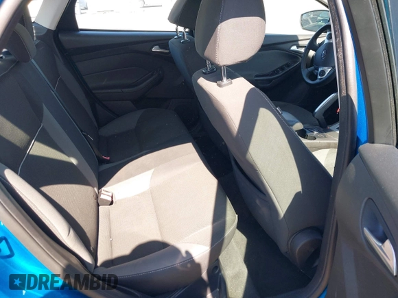 2013 Ford Focus SE z VIN 1FADP3F2XDL178239, wystawiony jako IAAI lot #42272364 z przebiegiem 108 773 mil mil oraz . Historia ofert i sprzedaży dostępna na DreamBid. Obrazek 8.