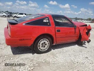 1986 Nissan 300ZX с VIN JN1HZ14S3GX158816, выставлен на аукционе Copart как лот 50692395 с пробегом 106 957 миль миль и Списание • Salvage title. История ставок и продаж доступна на DreamBid. Изображение 3.