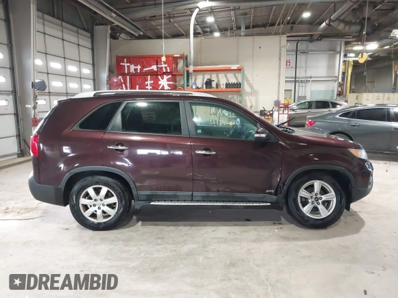 2012 Kia Sorento LX with VIN 5XYKTCA66CG264679, listed as a IAAI auction lot 41742682 with 161,781 mi miles. Bid and sale history available at carsss.com. Image 13.