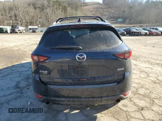 2018 Mazda CX-5 Grand Touring with VIN JM3KFBDM8J0399975, listed as a Copart auction lot 45998115 with 98,037 mi miles and Salvage Title. Bid and sale history available at DreamBid. Image 6.