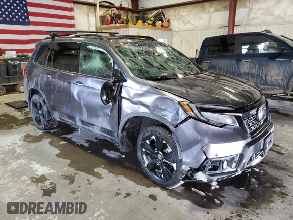 2021 Honda Passport Elite z VIN 5FNYF8H05MB021597, wystawiony jako Copart lot #44463515 z przebiegiem Nie podano mil oraz Szkoda całkowita • Salvage title. Historia ofert i sprzedaży dostępna na DreamBid. Obrazek 4.