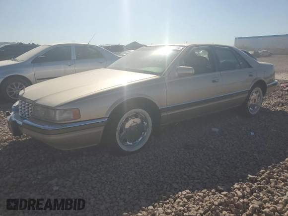 1996 Cadillac Seville Luxury SLS z VIN 1G6KS52Y9TU831614, wystawiony jako Copart lot #73215144 z przebiegiem 119 461 mil mil oraz Czysty tytuł • Clean title. Historia ofert i sprzedaży dostępna na DreamBid. Obrazek 1.