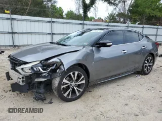 2016 Nissan Maxima SL with VIN 1N4AA6AP0GC379967, listed as a Copart auction lot 60839615 with 107,201 mi miles and Salvage title. Bid and sale history available at DreamBid. Image 1.