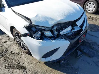 2018 Toyota Camry LE with VIN 4T1B11HK3JU658046, listed as a IAAI auction lot 41222583 with 325,249 mi miles. Bid and sale history available at carsss.com. Image 6.