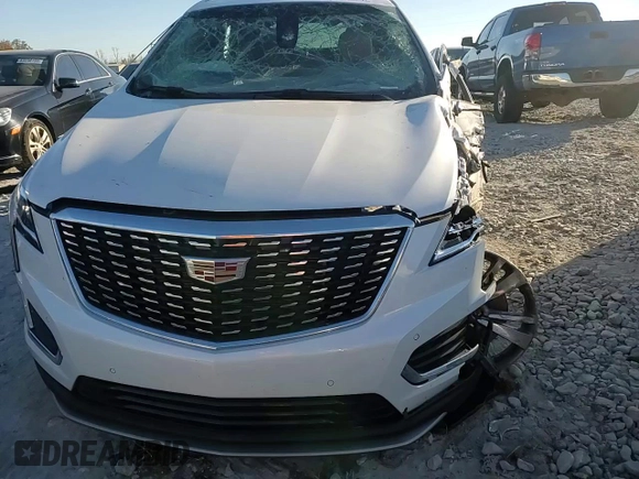 2024 Cadillac XT5 FWD Premium Luxury with VIN 1GYKNCRS7RZ740471, listed as a Copart auction lot 82275174 with 14,747 mi miles and Salvage Title. Bid and sale history available at carsss.com. Image 10.