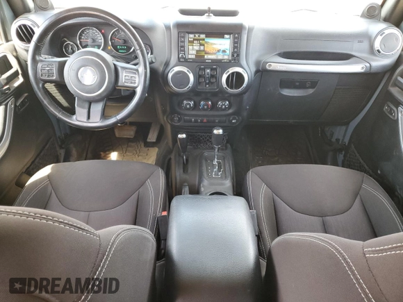 2014 Jeep Wrangler Unlimited Sahara with VIN 1C4BJWEG7EL228307, listed as a Copart auction lot 58663455 with 188,024 mi miles and Salvage title. Bid and sale history available at DreamBid. Image 8.