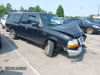 2000 Ford Ranger XL z VIN 1FTYR14V0YPB97940, wystawiony jako IAAI lot #42404601 z przebiegiem 129 320 mil mil oraz . Historia ofert i sprzedaży dostępna na DreamBid. Obrazek 1.