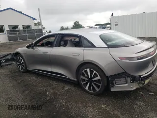 2023 Lucid Air Touring z VIN 50EA1TEA0PA001802, wystawiony jako Copart lot #66840374 z przebiegiem Nie podano mil oraz Szkody całkowita. Historia ofert i sprzedaży dostępna na DreamBid. Obrazek 2.