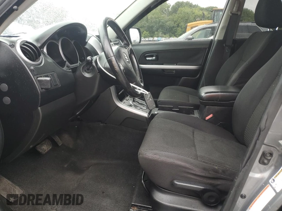 2009 Suzuki Grand Vitara z VIN JS3TD044794100716, wystawiony jako Copart lot #58739065 z przebiegiem 151 638 mil mil oraz Szkoda całkowita • Salvage title. Historia ofert i sprzedaży dostępna na DreamBid. Obrazek 7.