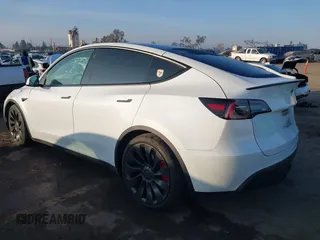 2021 Tesla Model Y Performance with VIN 5YJYGDEF2MF258711, listed as a IAAI auction lot 41367832 with 47,662 mi miles and . Bid and sale history available at DreamBid. Image 3.