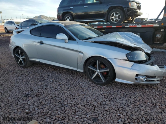 2004 Hyundai Tiburon GT with VIN KMHHN65F44U130202, listed as a Copart auction lot 43193404 with 207,694 mi miles and Salvage Title. Bid and sale history available at carsss.com. Image 4.
