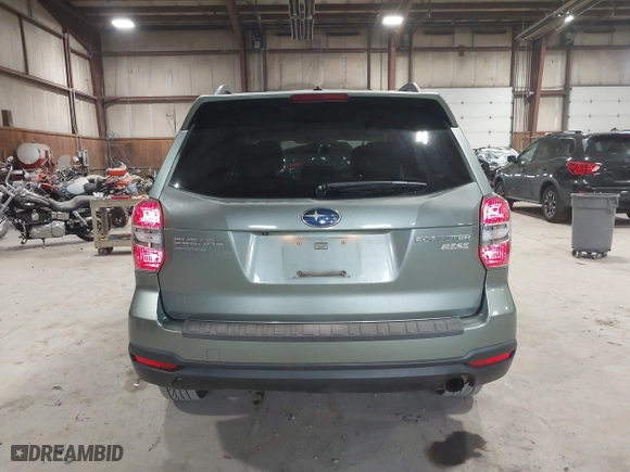 2014 Subaru Forester 2.5i Limited with VIN JF2SJAJC7EH512790, listed as a IAAI auction lot 42097522 with 112,419 mi miles. Bid and sale history available at carsss.com. Image 16.