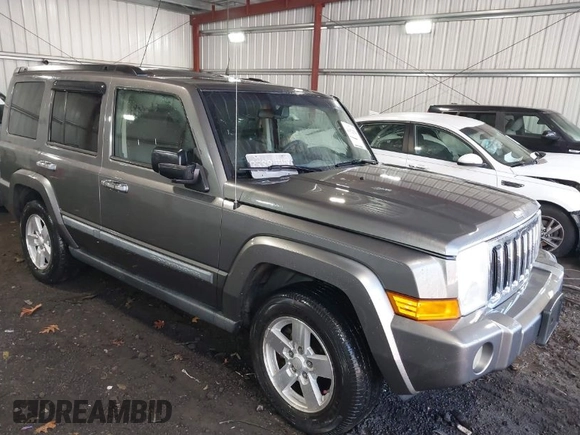2008 Jeep Commander Sport z VIN 1J8HH48K08C167681, wystawiony jako IAAI lot #41822546 z przebiegiem 155 572 mil mil oraz . Historia ofert i sprzedaży dostępna na DreamBid. Obrazek 1.
