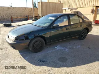 1997 Saturn SL with VIN 1G8ZH5281VZ133993, listed as a Copart auction lot 87155774 with 135,932 mi miles and Salvage Title. Bid and sale history available at carsss.com. Image 1.