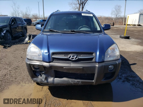 2005 Hyundai Tucson GL with VIN KM8JM72D55U167063, listed as a Copart auction lot 52002865 with 157,945 mi miles and Salvage Title. Bid and sale history available at carsss.com. Image 5.