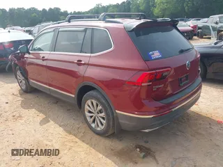 2018 Volkswagen Tiguan SEL with VIN 3VV3B7AX9JM054814, listed as a IAAI auction lot 42394400 with 92,160 mi miles and . Bid and sale history available at DreamBid. Image 3.