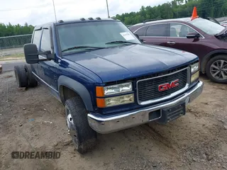 2000 GMC Sierra 3500 z VIN 1GTHK33F9YF413736, wystawiony jako IAAI lot #42197845 z przebiegiem 255 855 mil mil oraz . Historia ofert i sprzedaży dostępna na DreamBid. Obrazek 1.
