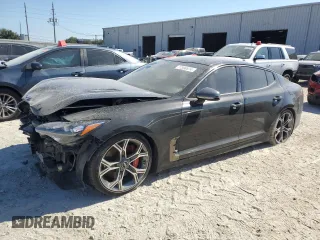 2020 Kia Stinger GT with VIN KNAE35LC8L6072093, listed as a Copart auction lot 77596574 with 77,347 mi miles and Salvage Title. Bid and sale history available at carsss.com. Image 1.