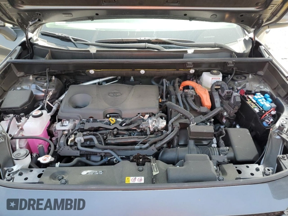 2024 Toyota RAV4 Hybrid LE with VIN JTMMWRFV7RD233242, listed as a Copart auction lot 60878815 with 11,064 mi miles and Salvage title. Bid and sale history available at DreamBid. Image 12.