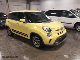 2015 FIAT 500L Urbana Trekking with VIN ZFBCFADH5FZ033844, listed as a IAAI auction lot 41186739 with 86,587 mi miles. Bid and sale history available at carsss.com. Image 1.
