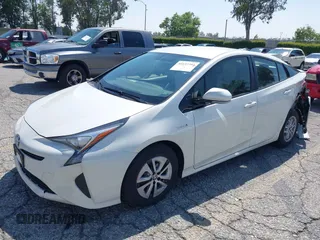 2016 Toyota Prius Four with VIN JTDKARFUXG3511034, listed as a IAAI auction lot 42137394 with 77,424 mi miles. Bid and sale history available at carsss.com. Image 17.