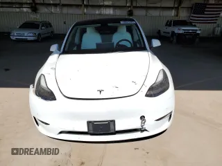 2022 Tesla Model Y Performance z VIN 7SAYGDEF0NF337959, wystawiony jako Copart lot #56871985 z przebiegiem 54 527 mil mil oraz Szkoda całkowita • Salvage title. Historia ofert i sprzedaży dostępna na DreamBid. Obrazek 5.