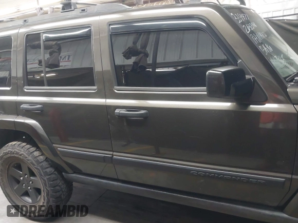 2006 Jeep Commander with VIN 1J8HG48KX6C263348, listed as a IAAI auction lot 42128039 with 208,605 mi miles and . Bid and sale history available at DreamBid. Image 14.
