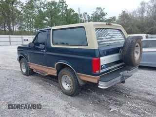 1995 Ford Bronco Custom with VIN 1FMEU15H2SLB87303, listed as a IAAI auction lot 41763857 with 1 mi miles. Bid and sale history available at carsss.com. Image 3.
