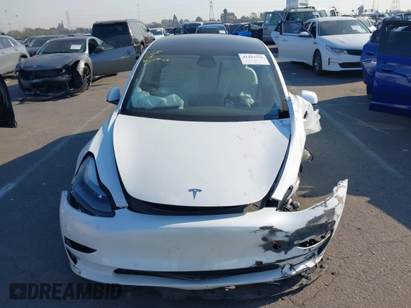 2022 Tesla Model 3 with VIN 5YJ3E1EA4NF319237, listed as a IAAI auction lot 41263761 with 44,384 mi miles and . Bid and sale history available at DreamBid. Image 12.