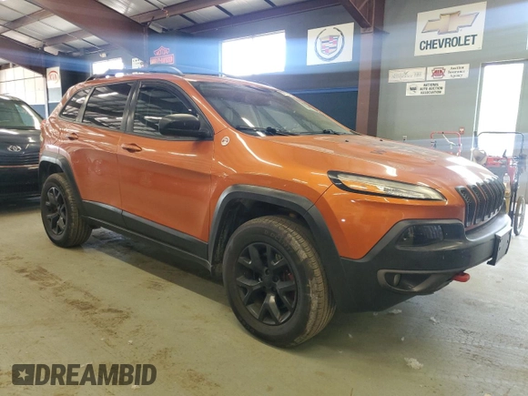 2015 Jeep Cherokee Trailhawk z VIN 1C4PJMBS8FW727992, wystawiony jako Copart lot #59799425 z przebiegiem 127 853 mil mil oraz Czysty tytuł • Clean title. Historia ofert i sprzedaży dostępna na DreamBid. Obrazek 4.