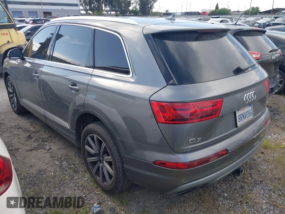 2017 Audi Q7 Premium with VIN WA1AAAF71HD010675, listed as a IAAI auction lot 41956959 with 136,549 mi miles and . Bid and sale history available at DreamBid. Image 3.