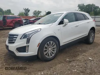 2019 Cadillac XT5 Luxury AWD with VIN 1GYKNDRS8KZ197885, listed as a Copart auction lot 59770265 with 70,742 mi miles and Salvage title. Bid and sale history available at DreamBid. Image 1.