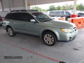 2009 Subaru Outback Ltd with VIN 4S4BP66C797316617, listed as a IAAI auction lot 42116772 with 168,117 mi miles. Bid and sale history available at carsss.com. Image 1.