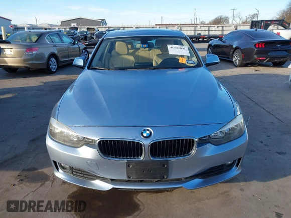 2013 BMW 3 Series 320i with VIN WBA3B1C56DK128089, listed as a IAAI auction lot 41332091 with 101,155 mi miles. Bid and sale history available at carsss.com. Image 11.