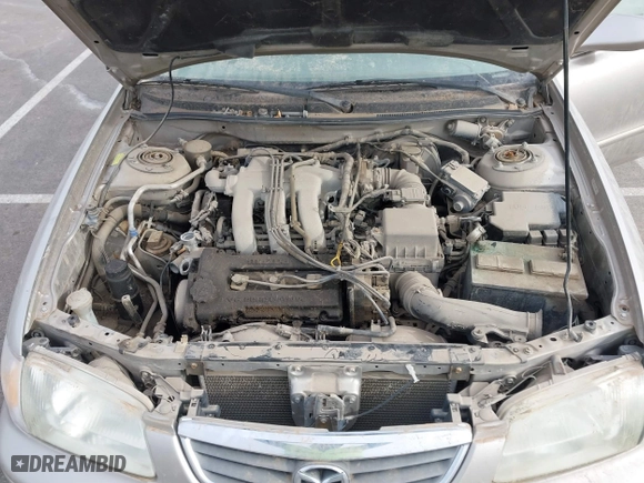 2002 Mazda 626 LX with VIN 1YVGF22DX25263864, listed as a IAAI auction lot 41846129 with 282,516 mi miles. Bid and sale history available at carsss.com. Image 10.