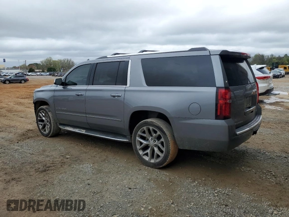 2018 Chevrolet Suburban Premier with VIN 1GNSCJKC5JR293962, listed as a Copart auction lot 50641835 with 137,598 mi miles and Salvage Title. Bid and sale history available at DreamBid. Image 2.