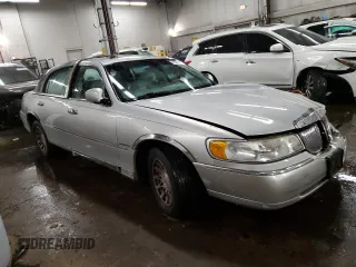 2002 Lincoln Town Car Signature z VIN 1LNHM82W02Y665486, wystawiony jako Copart lot #41381275 z przebiegiem Nie podano mil oraz Szkoda całkowita • Salvage title. Historia ofert i sprzedaży dostępna na DreamBid. Obrazek 4.