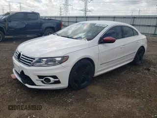 2014 Volkswagen CC R-Line with VIN WVWBN7ANXEE527633, listed as a Copart auction lot 67687694 with 84,561 mi miles and Salvage Title. Bid and sale history available at carsss.com. Image 1.