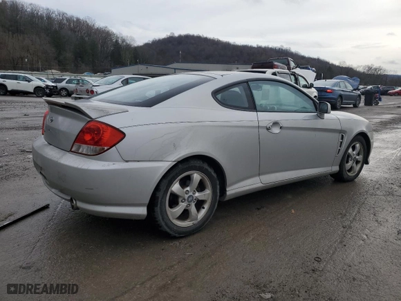 2006 Hyundai Tiburon GS with VIN KMHHM65D96U222152, listed as a Copart auction lot 85370164 with 58,892 mi miles and Clean Title. Bid and sale history available at carsss.com. Image 3.