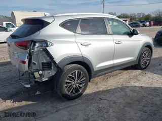 2020 Hyundai Tucson Sport with VIN KM8J33AL5LU217879, listed as a IAAI auction lot 41378700 with 82,684 mi miles. Bid and sale history available at carsss.com. Image 4.
