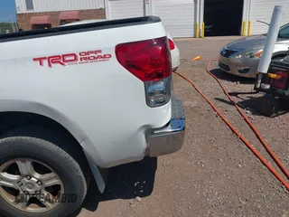 2007 Toyota Tundra SR5 with VIN 5TBRT54167S453554, listed as a IAAI auction lot 42037965 with 307,246 mi miles and . Bid and sale history available at DreamBid. Image 6.